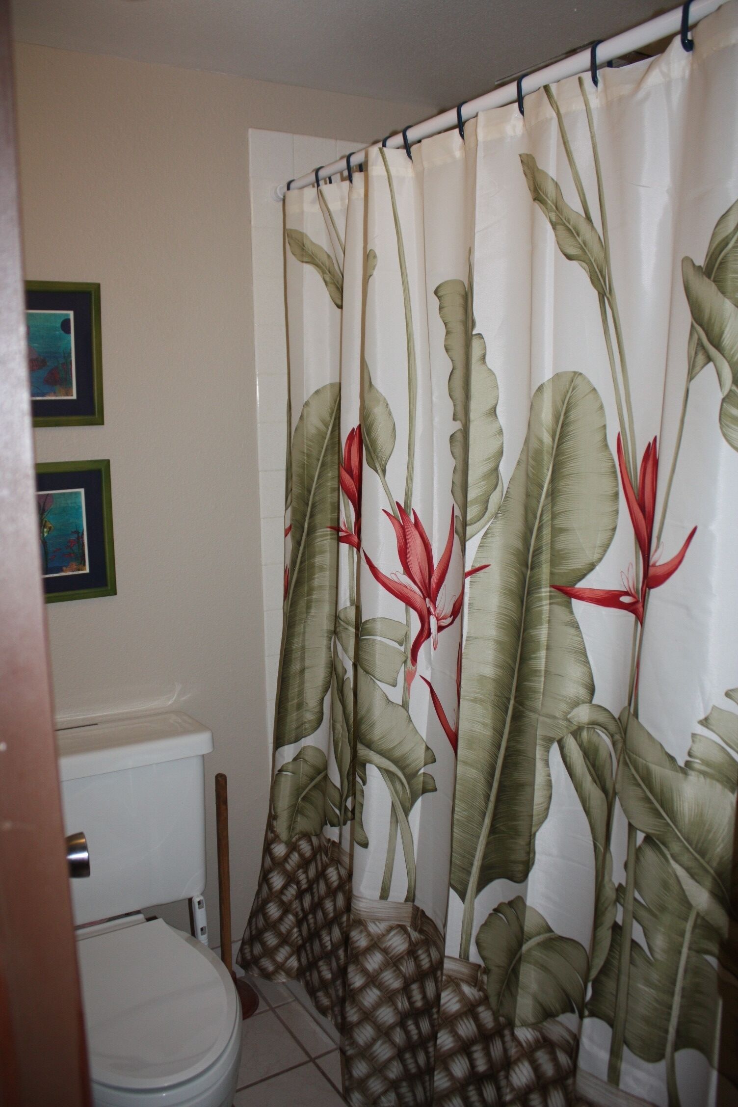 Bathroom with floral shower curtain