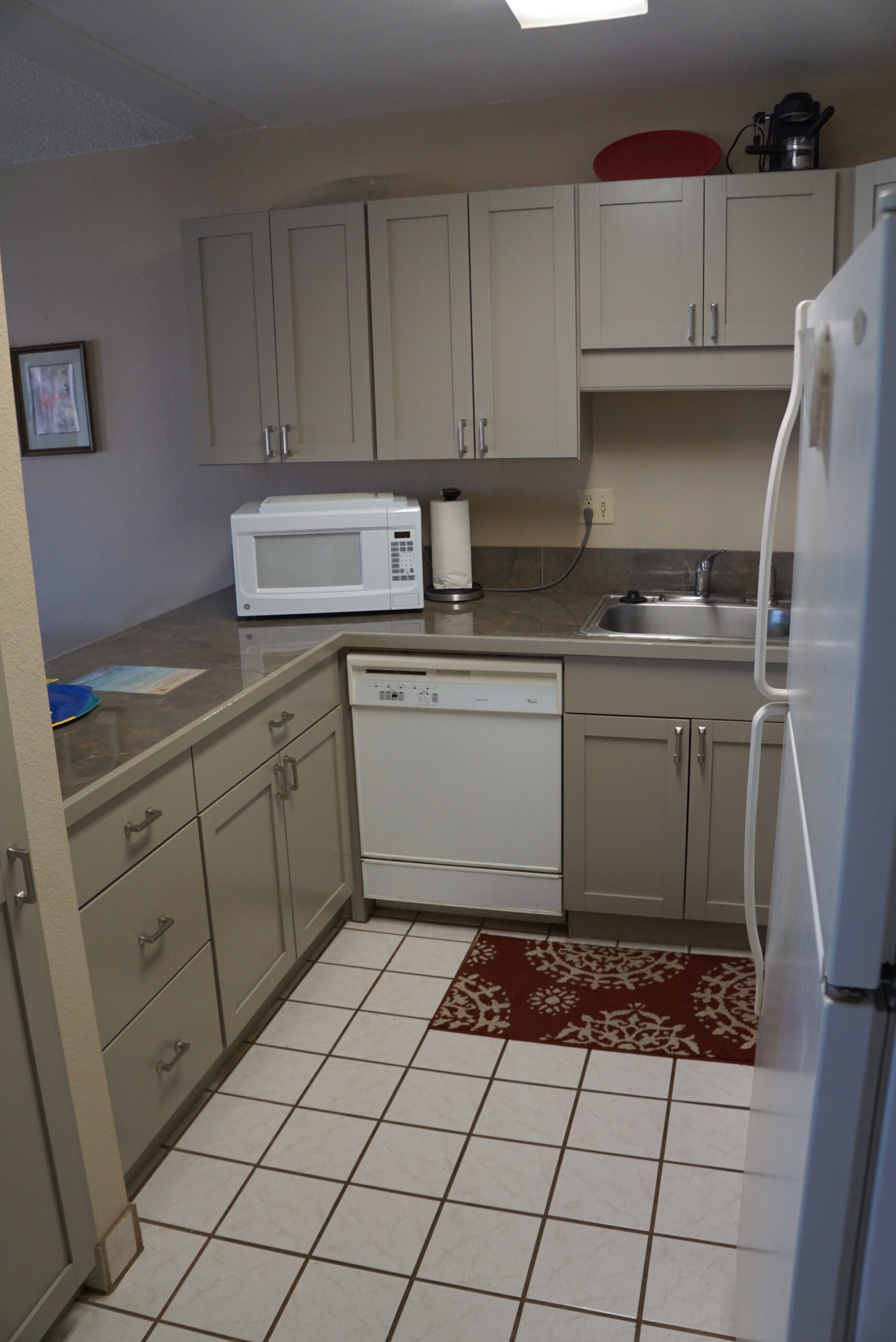 Modern kitchen with gray cabinets and appliances