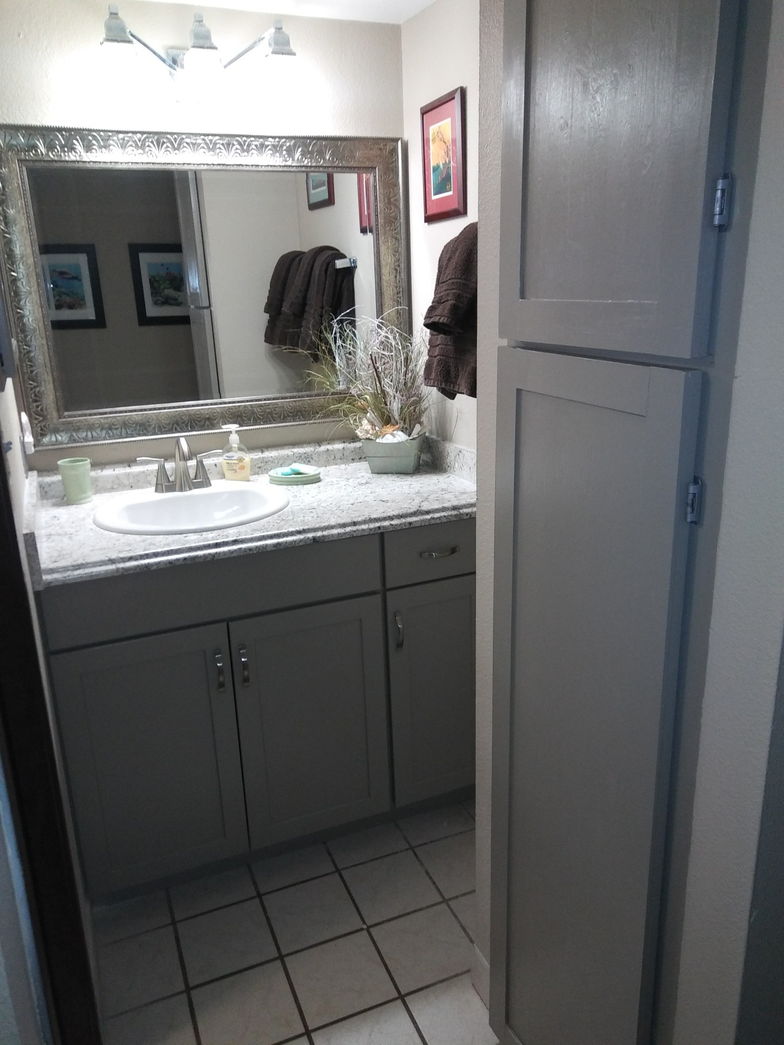 Modern bathroom with vanity and mirror.