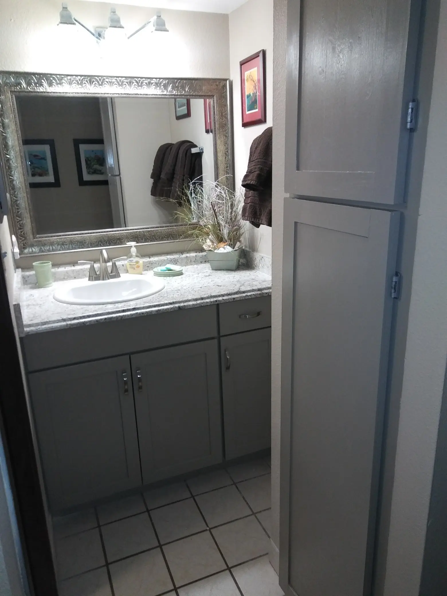 Modern bathroom with vanity and mirror.